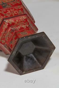 A Chinese Red, Black and Gilt Lacquer Faceted Vase