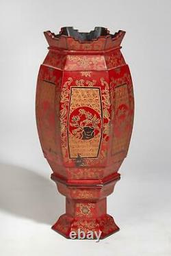 A Chinese Red, Black and Gilt Lacquer Faceted Vase