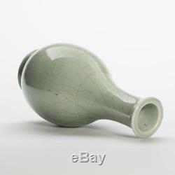 An antique Chinese celadon porcelain bottle vase, Ming dynasty