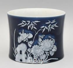 An antique large Chinese blue ground porcelain brushpot, Qing dynasty