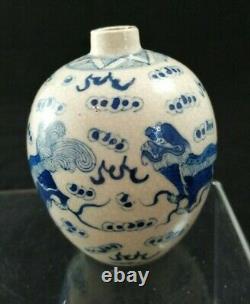 Antique Chinese Qing burnt porcelain jug vase white blue lion Qilin pattern