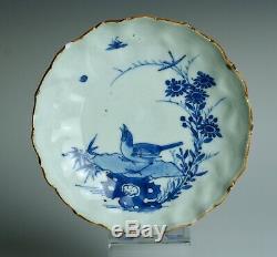 Fine Transitional Chinese porcelain dish, Chongzhen, 1630s, with bird on rock