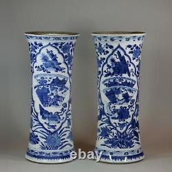 Near pair of Chinese blue and white beaker vases, Kangxi (1662-1722)